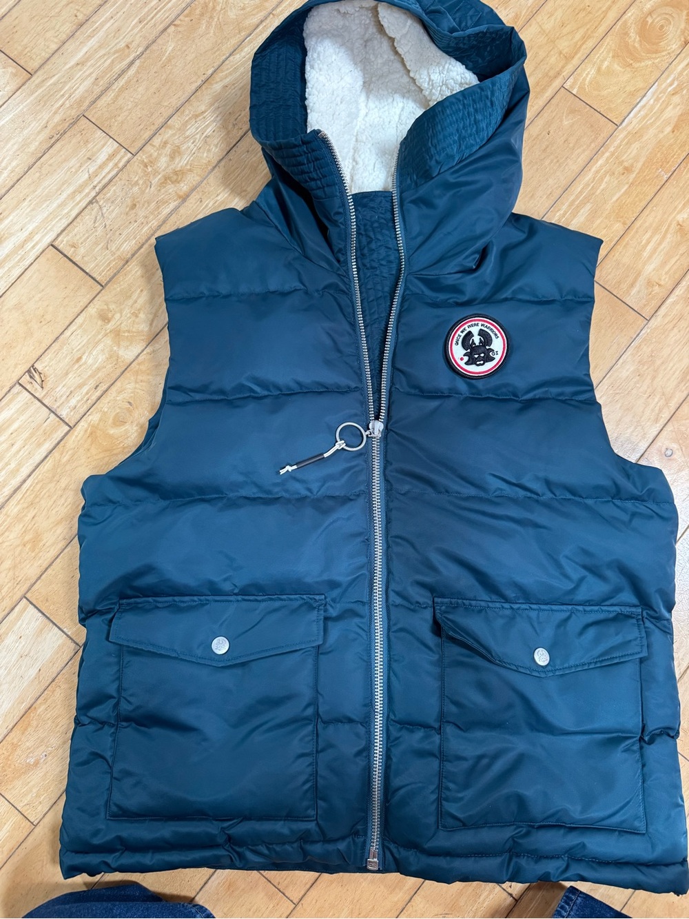 Once We Were Warriors Navy Quilted Puffer Vest with Sherpa Hood